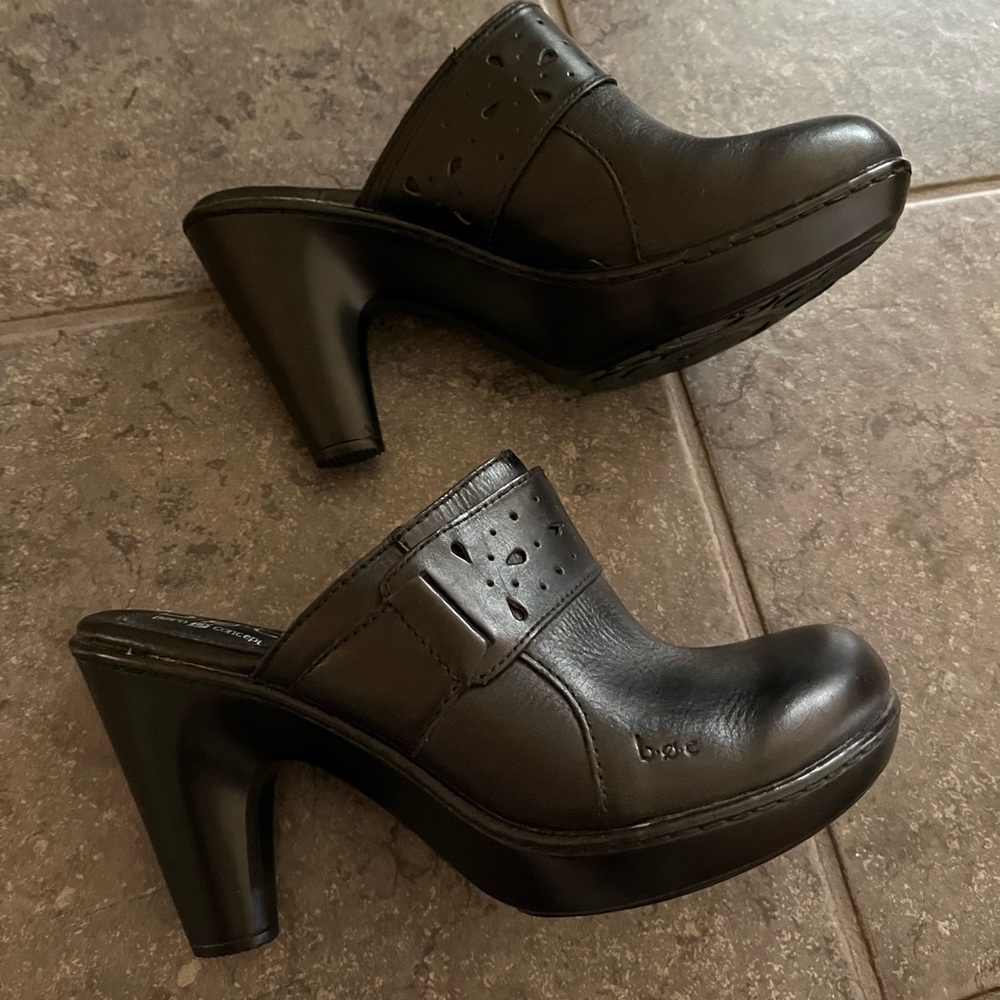 Black closed toe high heel mules. Size 9. New without tags.